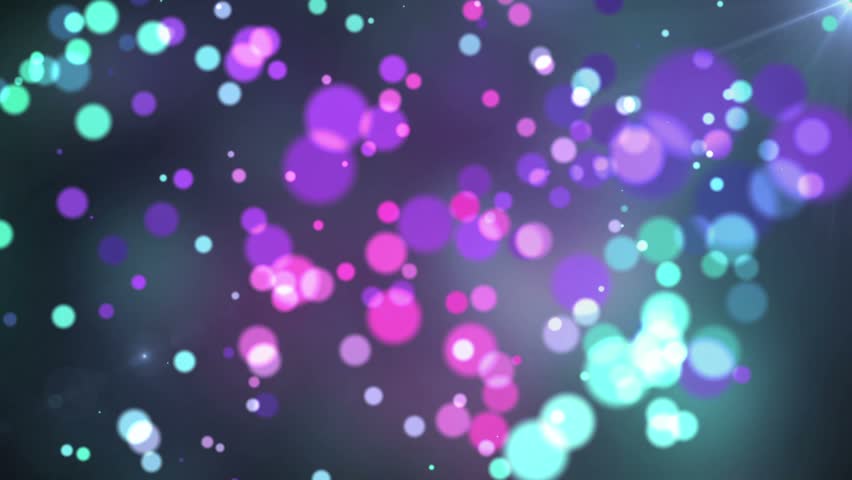 Abstract glowing circles of blurred twinkling light - black background