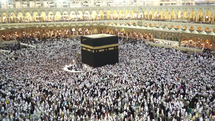Muslim pilgrims circumambulate the Kaaba at Masjidil Haram  in Makkah, Saudi Arabia. Muslims all around the world face the Kaaba during prayer time.  Royalty-Free Stock Footage #5090759