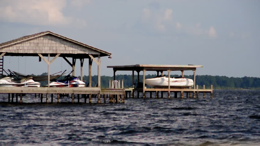 Boat docks on a lake.