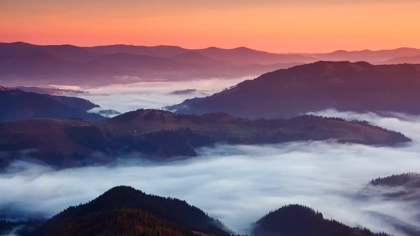 Time lapse clip. Fantastic mountain landscape with colorful cloud. Carpathian,