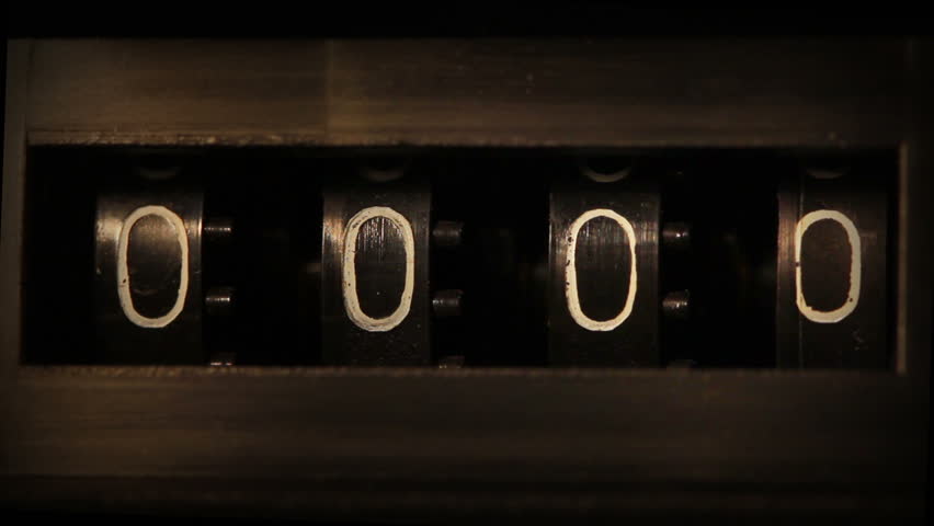 old mechanical counter counts numbers - macro