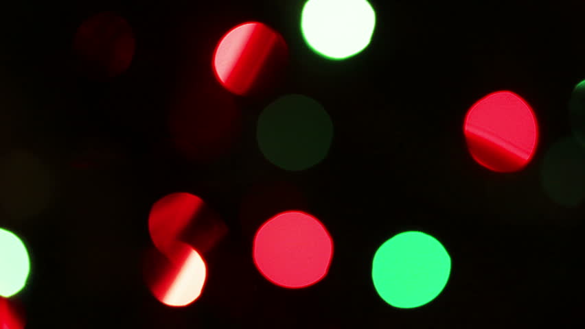 decorated christmas tree with flashing garlands - changing focus
