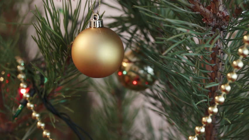 decorated christmas tree with flashing garlands closeup