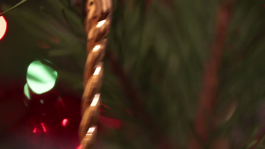 decorated christmas tree with flashing garlands closeup