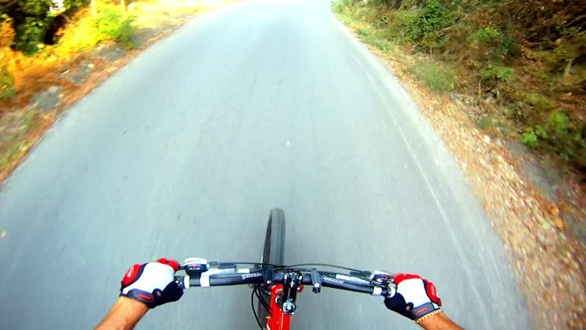 HD: Downhill on mountain bike - Stock Video. View from mountain bike at high