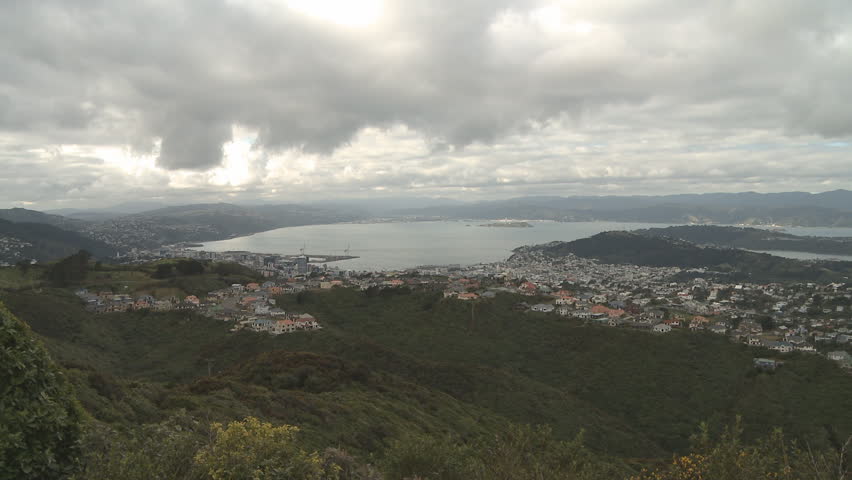 Welling, New Zealand. A time lapse of clouds moving over the city and harbor.