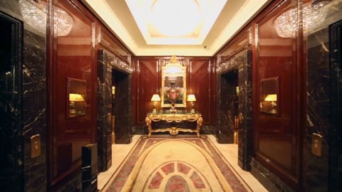 MOSCOW - MAY 29: Big vase near mirror in luxurious hall with elevators at Hotel Ritz-Carlton on 29 May 2012, Moscow, Russia.