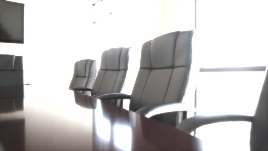Office conference room chairs dolly shot