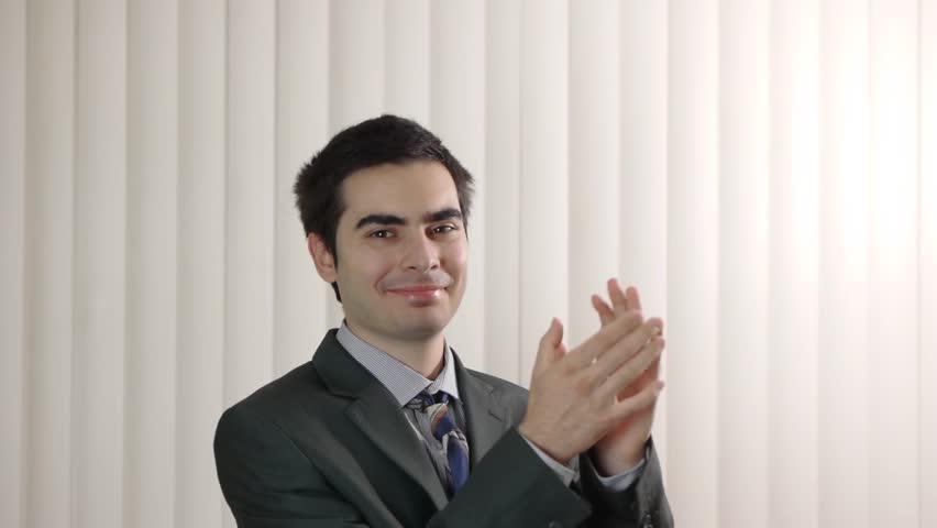 Clapping businessman