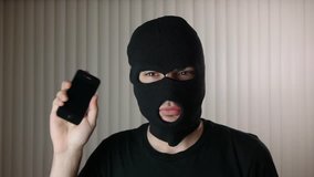 Hacker theft showing a stolen smartphone cellular device. Great video for and project involving cyber criminality and thief