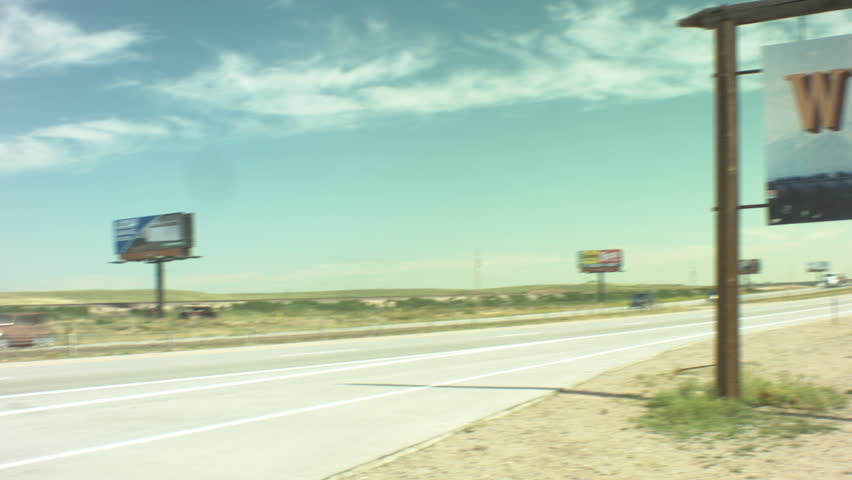 a shot of the welcome to wyoming sign