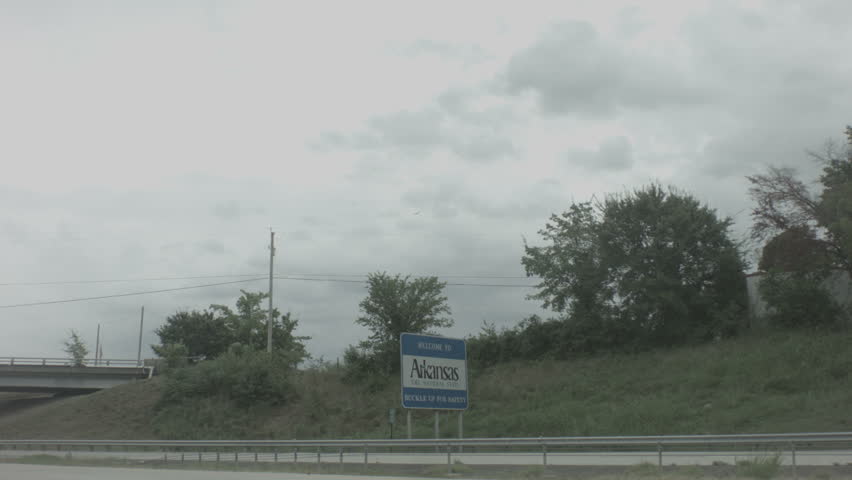 a shot of the welcome to arkansas sign.