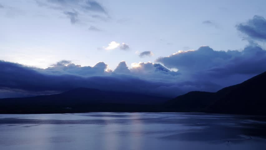 Time lapse of Mt.Fuji covered with cloud and Lake Motosuko in the early morning.