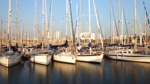 boats at sunset in port vell Barcelona  - Time Lapse