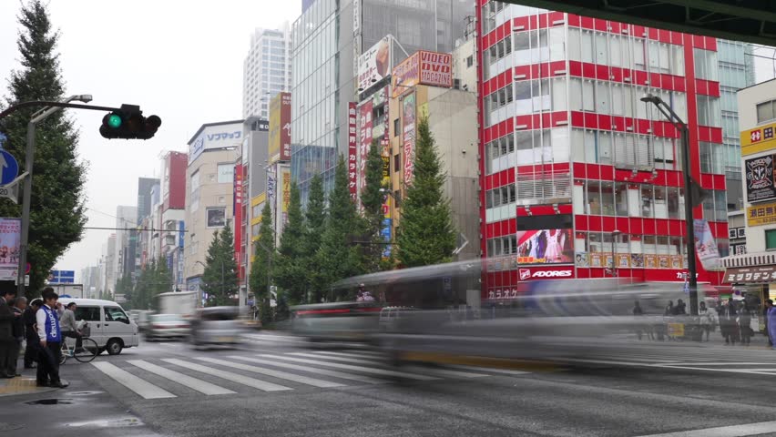 TOKYO, JAPAN - November 7 : Time lapse of a busy street with traffic of