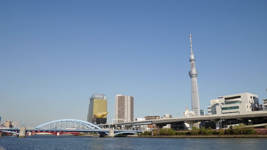 TOKYO, JAPAN - November 6 : Time lapse of Tokyo Skytree and office buildings in