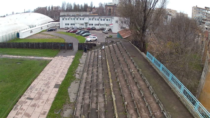 Old stadium with a female silhouette. Aerial