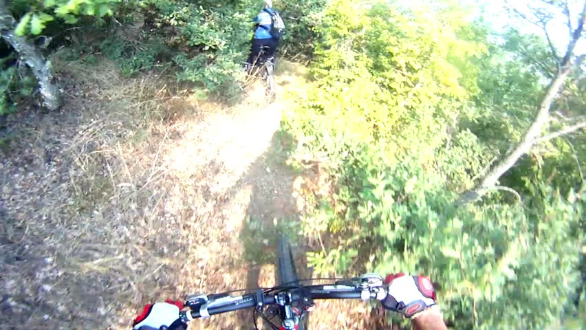 HD: Downhill Sport Race Cycling - Stock Video. Mountain bikers in extreme sport