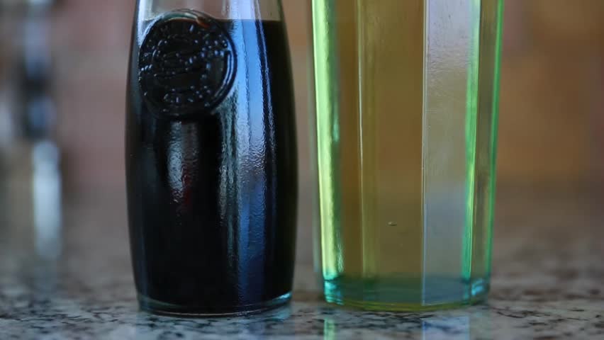 Glass containers with olive oil and balsamic vinegar