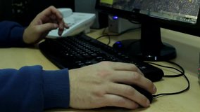 man typing on the keyboard in his office,video editor 