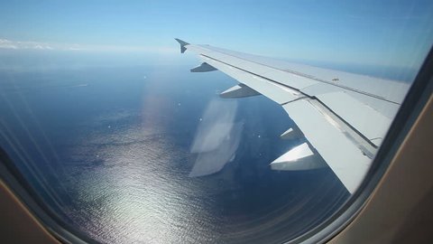 airplane flying over sea