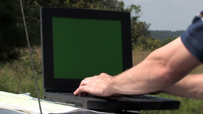 Using a laptop in the field.  Alpha matte included.