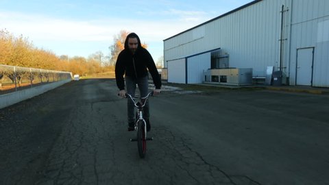 Man riding bicycle Stock Video