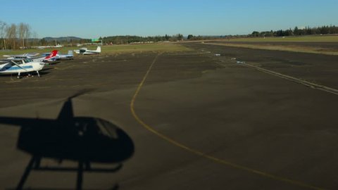 Helicopter shadow on runway Stock Video