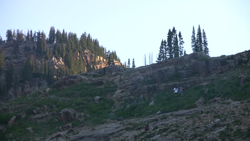 Video of man woman hiking trails of small mining town Alta Utah by Cecret Lake.  Little Cottonwood Canyon in Wasatch Mountains above Salt Lake City.  Don Despain of Rekindle Photo.