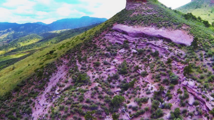 American west red buttes are dramatic in this aerial flyby
