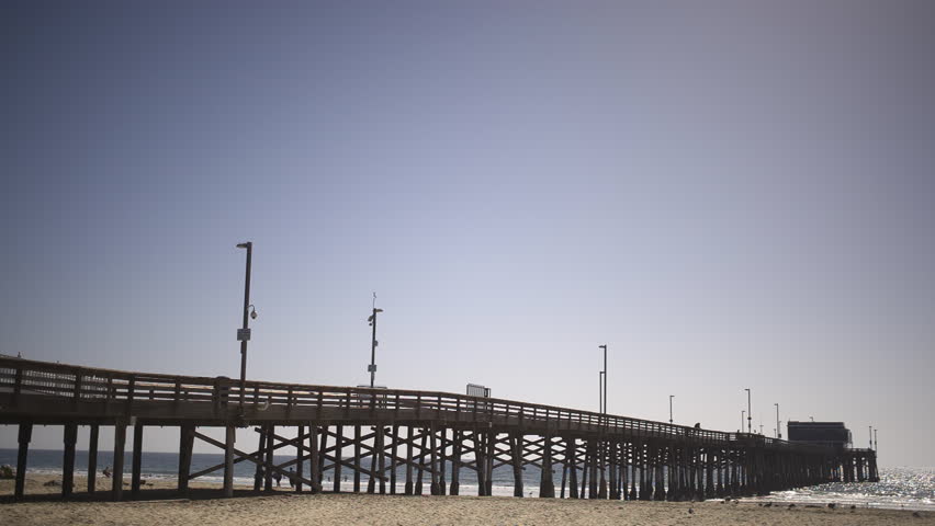 Newport Beach, California - October 4, 2013 - Wide panning shot of the Newport Pier.
