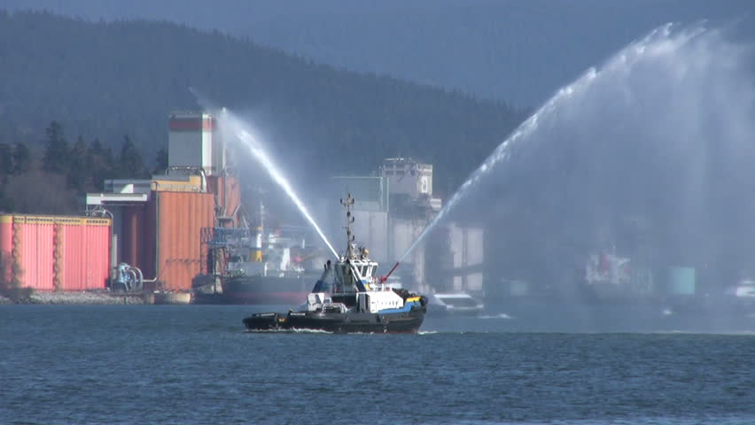Tug Boat Spraying Water Backwards Stock Footage Video (100% Royalty ...