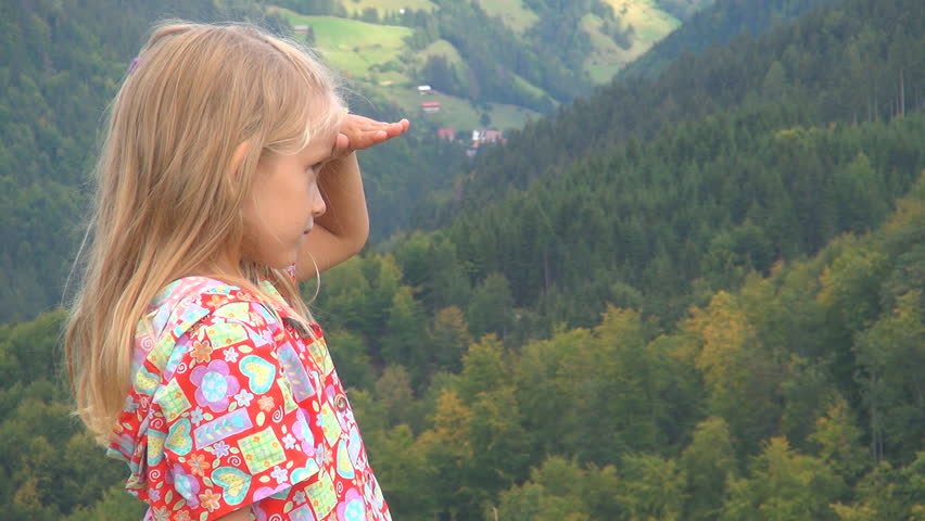 Little Girl Shading Eyes Looking at Mountains Landscape in Trip, Child