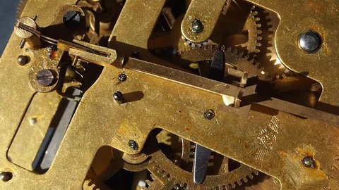 The mechanism of an old watch - a timing mechanism