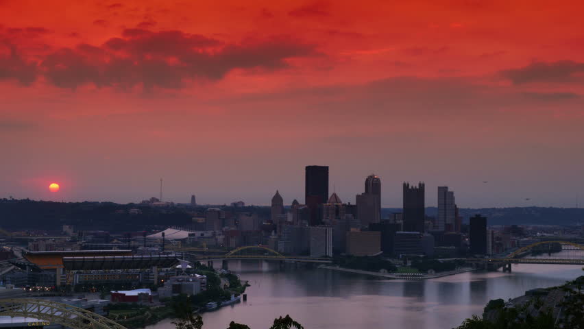 Time lapse of the sun rising over the city of Pittsburgh  4K Ultra HD