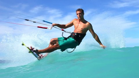 Young Man Kite Surfing In Ocean, Extreme summer sport in slow motion