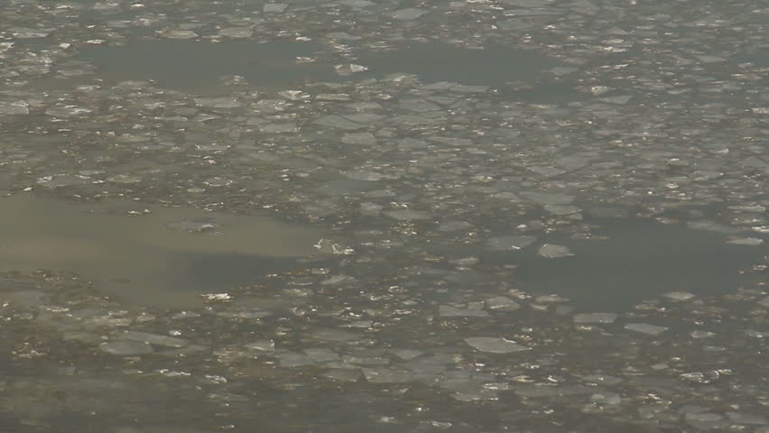 Ice Chunks in River. Large chunks of ice floating down the Detroit River.