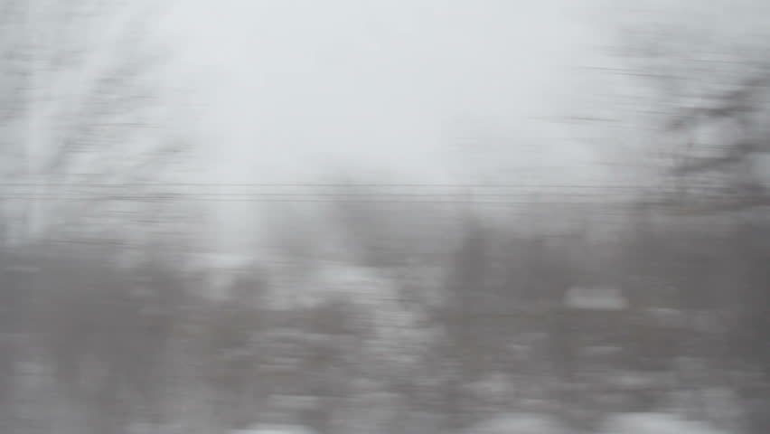 Train Travel in Snow 2. Looking out the window of a train passing through cold