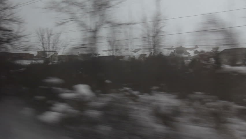 Train Travel in Snow 1. Looking out the window of a train passing through cold