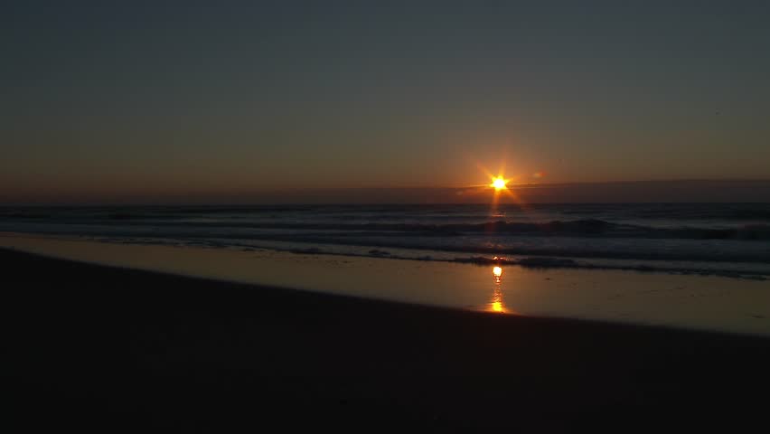 A morning sunrise over the ocean.  In 4K UltraHD.