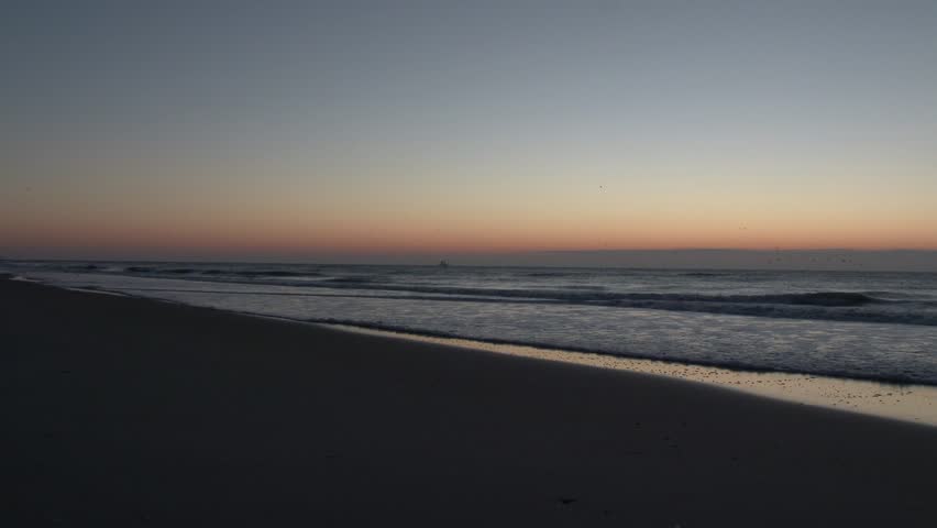 A morning sunrise over the ocean.  In 4K UltraHD.