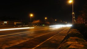 HD 1920x1080 Time-lapse footage of night time traffic traveling towards the video frame.