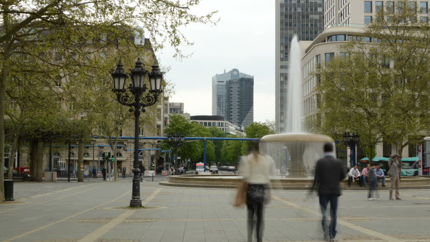 Frankfurt fountain the town square Operplatz in front of the old Opera House(not in frame) time lapse with long exposures in 4K ultra high definition