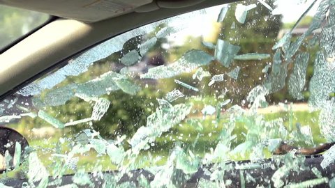 Passenger side car window broken into slow motion