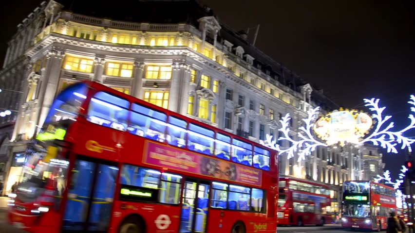 LONDON, UK - DECEMBER 07: Buses and cars drive through Regent Street under the
