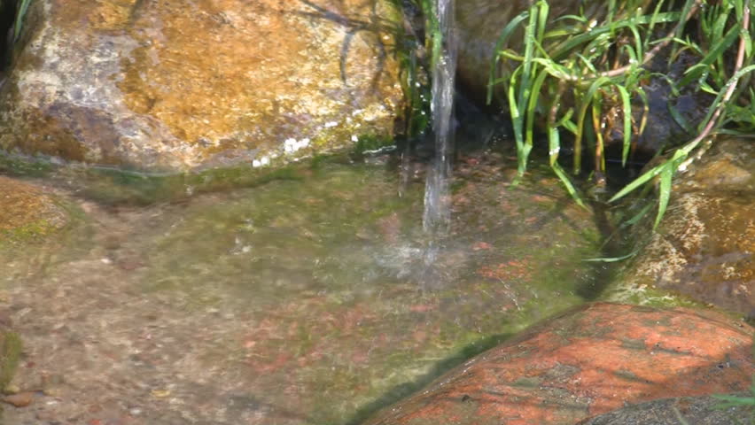 water splashing stone
