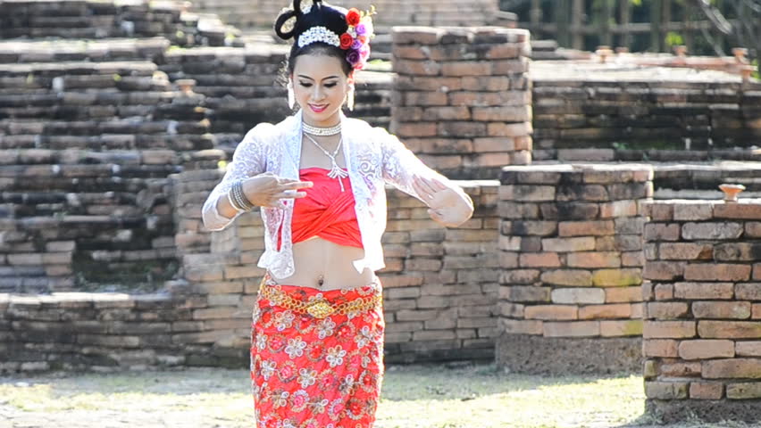 thai women in beautiful traditional dancing of thailand (three action shot)