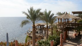 The view on outdoor restaurant and reef with corals at luxury hotel, Sharm el Sheikh, Egypt
