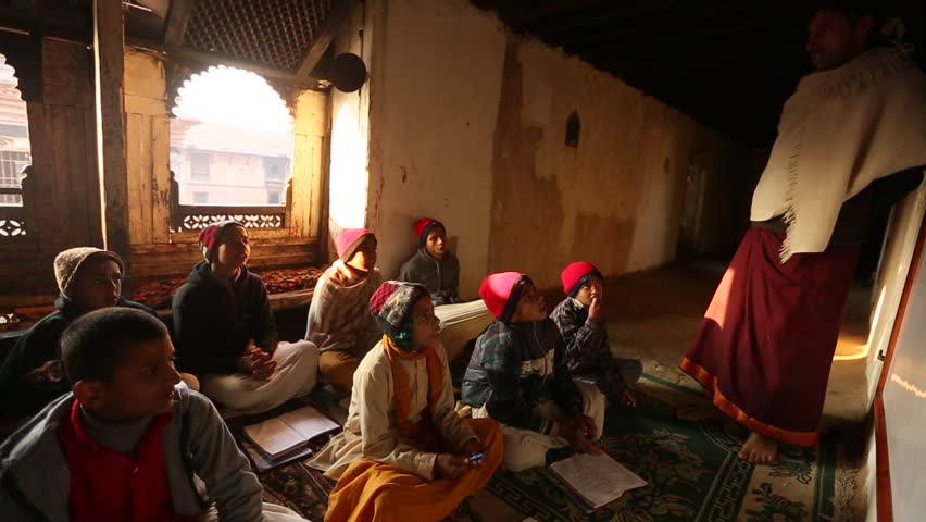 KATHMANDU, NEPAL - DEC 9: Unknown children in lesson at Jagadguru School, Dec 9,