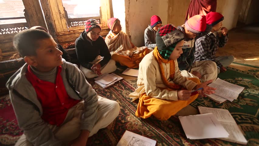 KATHMANDU, NEPAL - DEC 9: Unknown children in lesson at Jagadguru School, Dec 9,